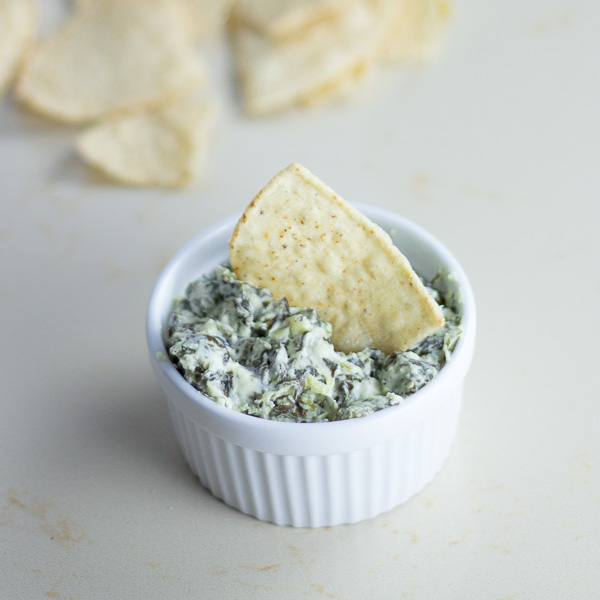 Greek Yogurt Spinach Artichoke dip - easy to make and taste delicious. A simple, healthy spinach artichoke dip